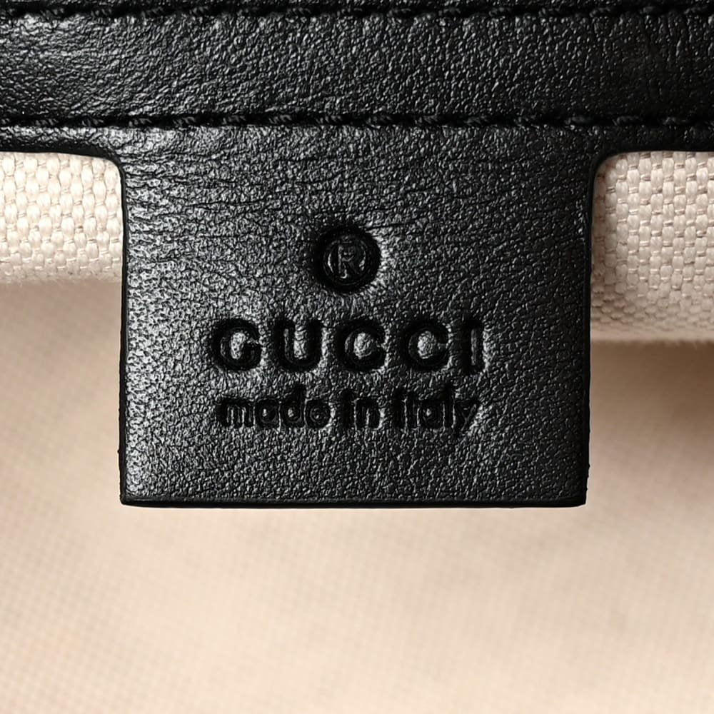 Gucci GG Embossed Duffle Bag