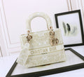 Dior Elegant Beige Embroidered Canvas Top Handle Handbag with Gold Charms