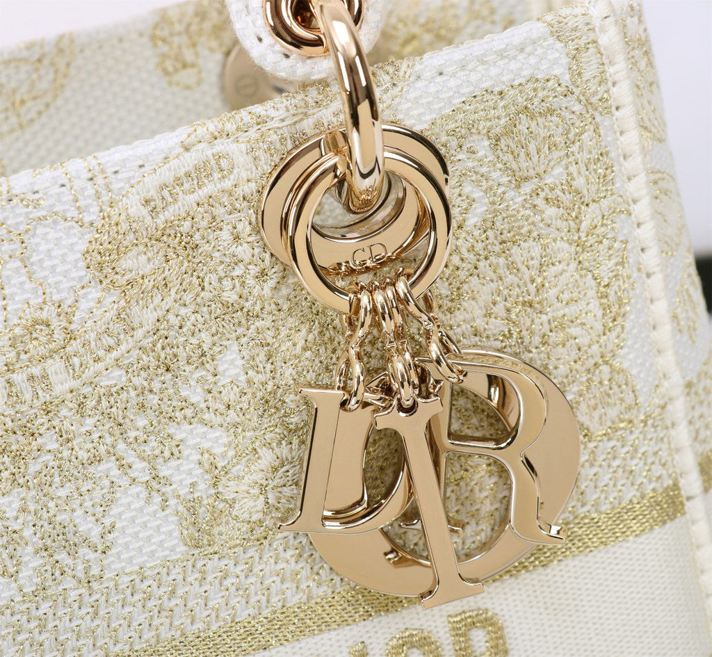 Dior Elegant Beige Embroidered Canvas Top Handle Handbag with Gold Charms