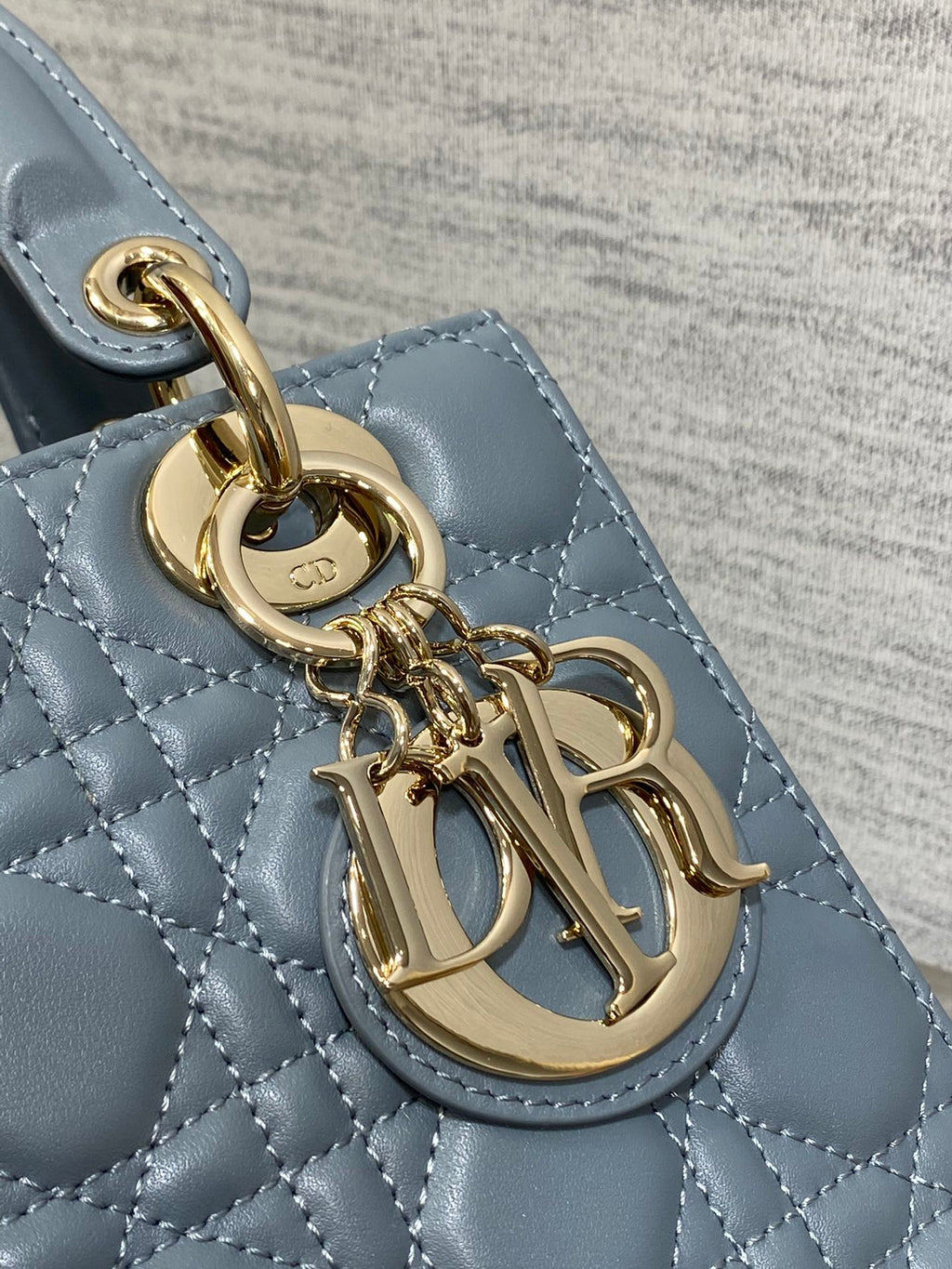 Dior Elegant Dusty Blue Quilted Leather Handbag with Shoulder Strap