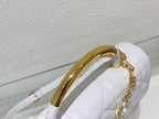 Dior Elegant White Quilted Leather Handbag with Gold Chain Strap